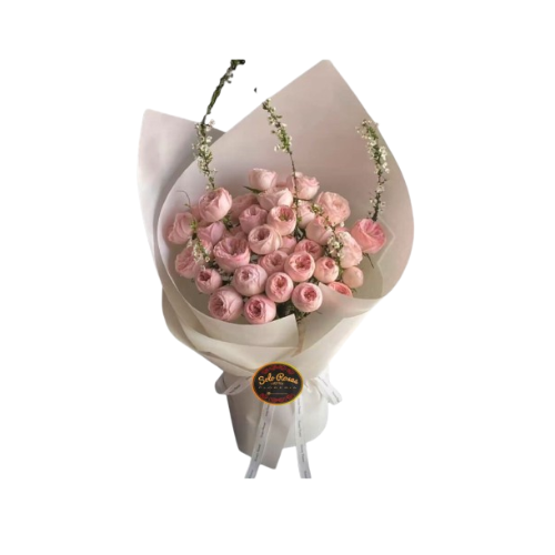 ramo de peonías rosadas envuelto elegante