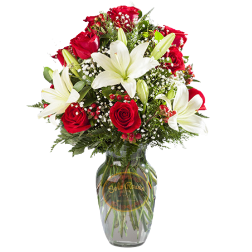 Florero de 12 rosas rojas y 3 lilium blancos con follaje decorativo